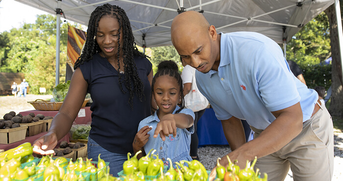 family at farmers market